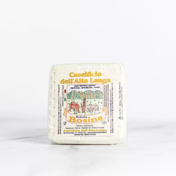 Scheibe Tomme du Pièmont, ein Dreimilchkäse aus dem Piemont. My Little Italy