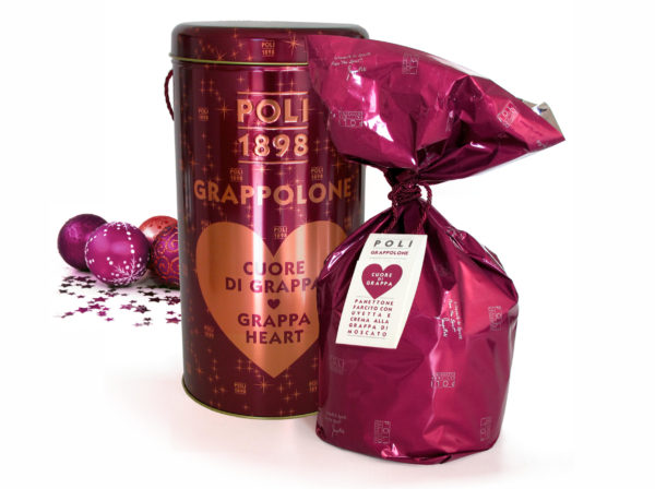 Packaging du Panettone à la Grappa Poli de My Little Italy avec une tranche révélant l'onctueuse crème à la Grappa et les raisins secs.