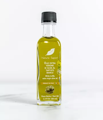 Bouteille de 60ml d'huile d'olive extra-vierge aromatisée à la truffe blanche disponible sur My Little Italy