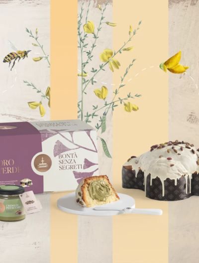 Colomba pasquale Oro Verde da 1 kg, realizzata a mano da Fiasconaro, presentata con il suo vasetto di pistacchi e un coltello per spalmarla.